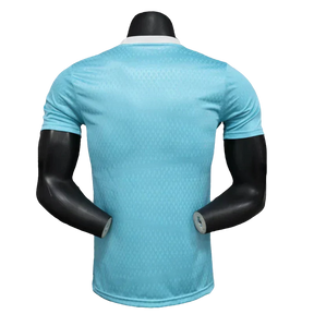 Camisa Arsenal 25/26 Pré-Jogo - Azul Celeste - Versão Jogador